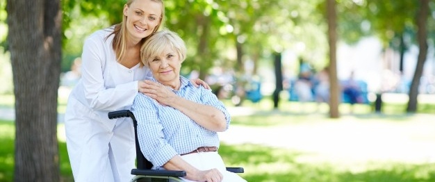 senior-woman-with-her-caregiver-outdoor_1098-2987-612392-edited.jpg
